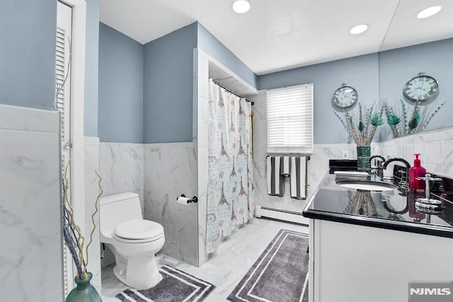 bathroom with tile walls, a shower with curtain, toilet, vanity, and baseboard heating