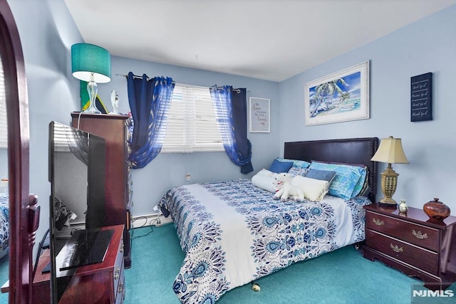 carpeted bedroom featuring a baseboard radiator