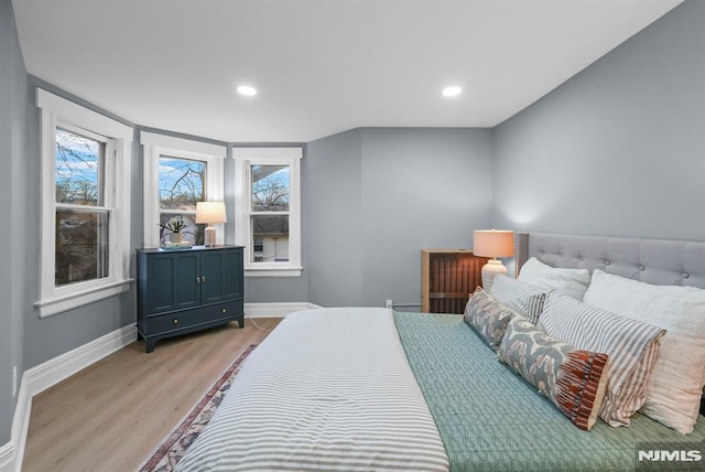 bedroom featuring light wood-type flooring