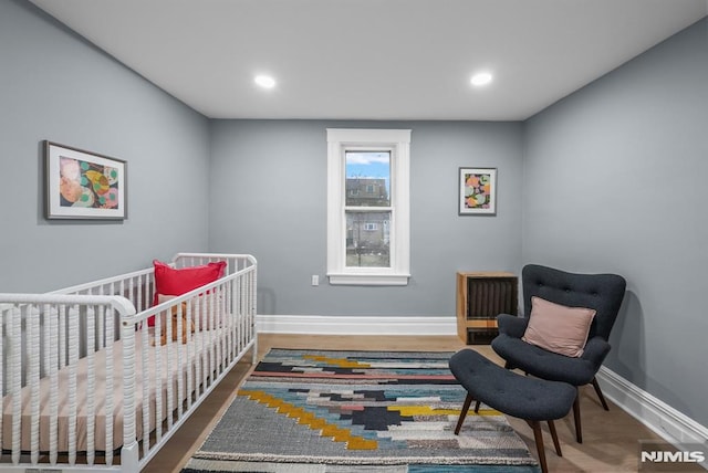 bedroom featuring hardwood / wood-style flooring