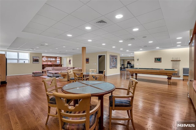 dining area with pool table and light hardwood / wood-style flooring