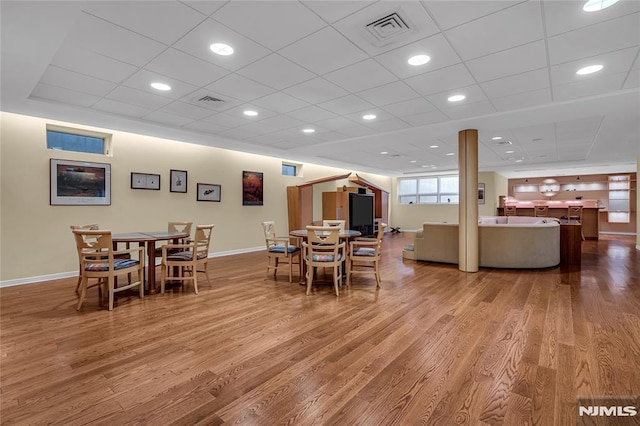 dining space featuring light hardwood / wood-style floors