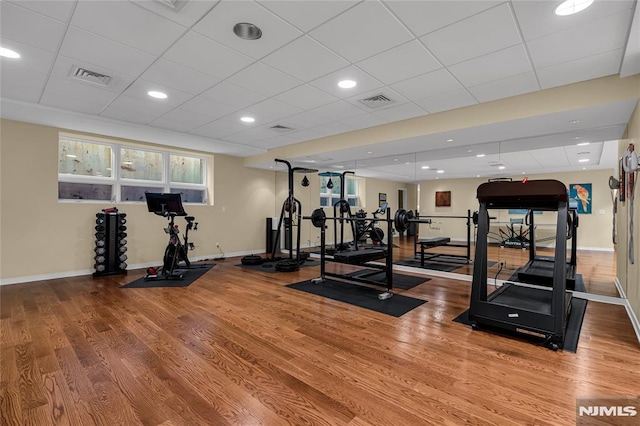 exercise room featuring hardwood / wood-style flooring