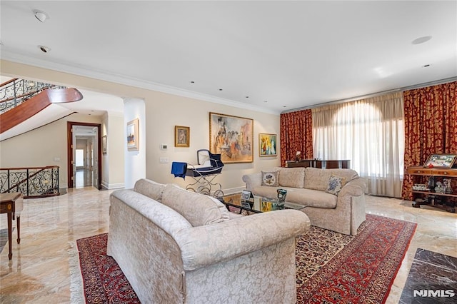 living room with ornamental molding