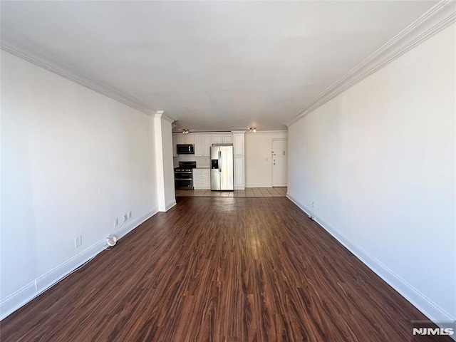 unfurnished living room featuring dark hardwood / wood-style floors and crown molding