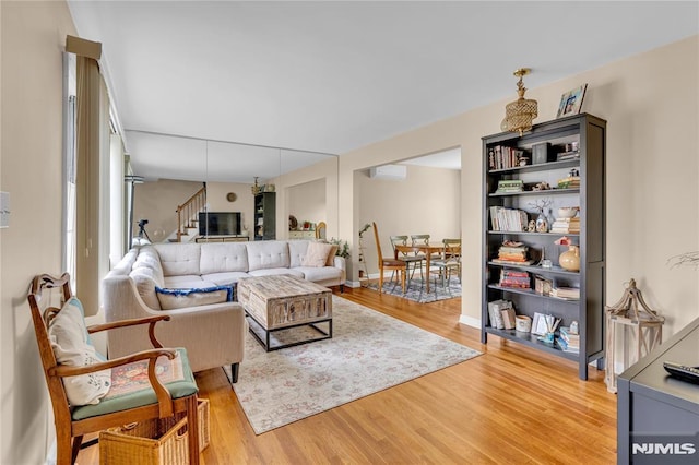 living room with hardwood / wood-style floors