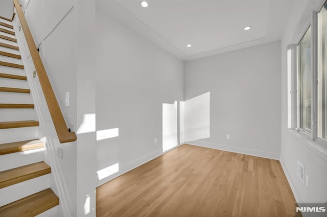 spare room featuring light wood-type flooring