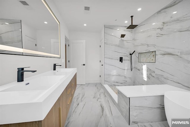 bathroom featuring vanity and plus walk in shower