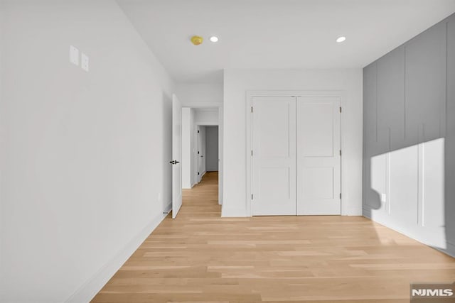 hallway featuring light wood-type flooring