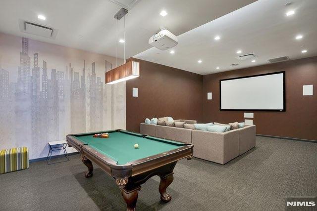 recreation room with billiards and carpet