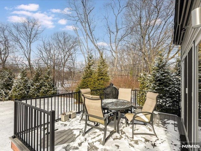 view of snow covered deck