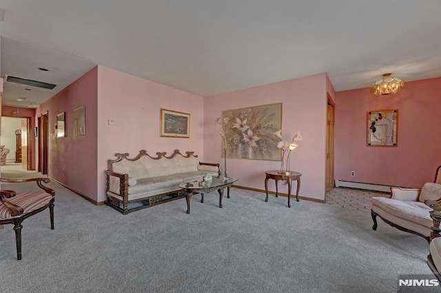 sitting room with light colored carpet, a chandelier, and a baseboard radiator