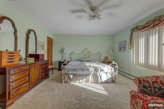 bedroom with light carpet, ceiling fan, and a baseboard heating unit