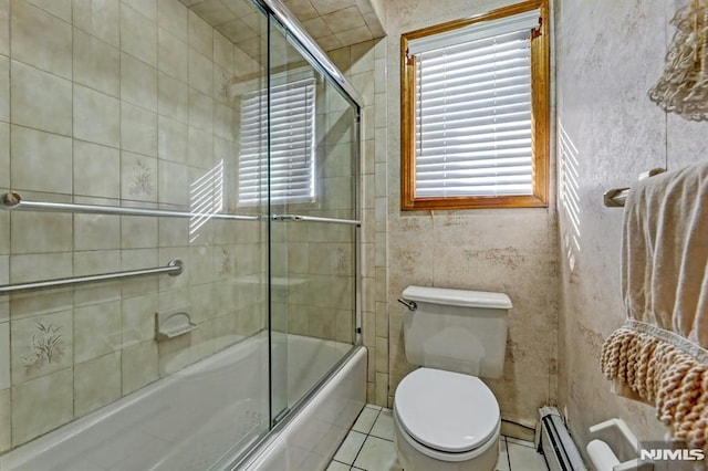 bathroom featuring toilet, baseboard heating, tile patterned floors, and enclosed tub / shower combo