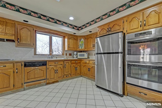 kitchen with sink and stainless steel appliances