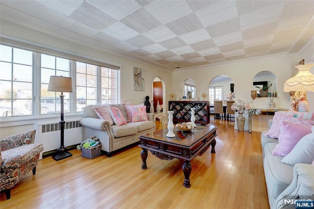 120 Prospect Ave, Hackensack, NJ 07601 - living room featuring radiator, crown molding, and hardwood / wood-style floors