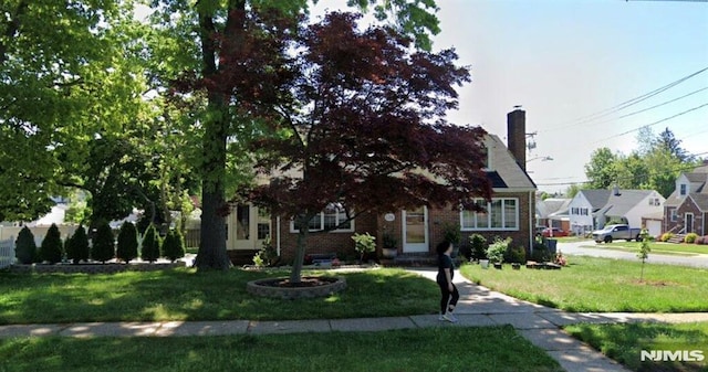 120 Prospect Ave, Hackensack, NJ 07601 - view of front facade with a front yard