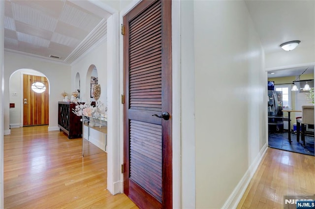 120 Prospect Ave, Hackensack, NJ 07601 - hallway with crown molding and light hardwood / wood-style floors