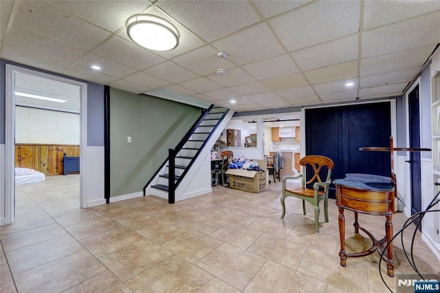 120 Prospect Ave, Hackensack, NJ 07601 - basement with a drop ceiling and wooden walls