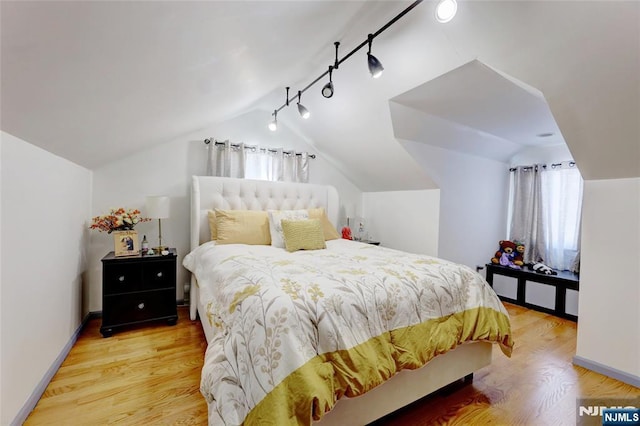120 Prospect Ave, Hackensack, NJ 07601 - bedroom with wood-type flooring and vaulted ceiling