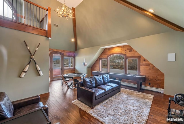 living room featuring beam ceiling, a baseboard heating unit, a notable chandelier, and dark hardwood / wood-style flooring