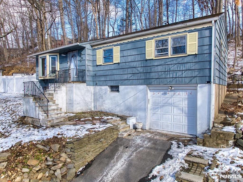 view of front of home featuring a garage