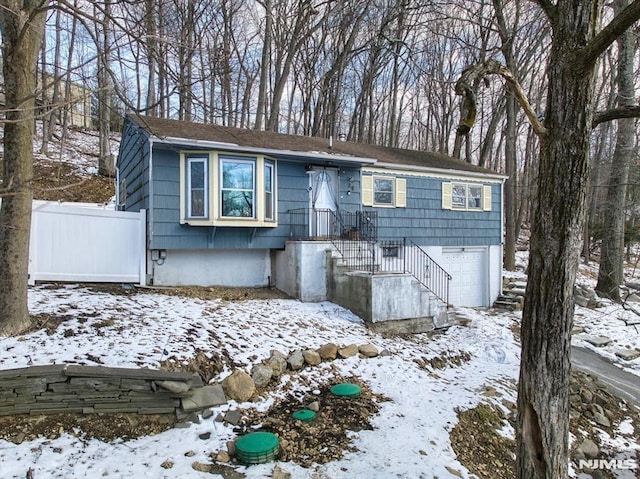 view of front of property featuring a garage