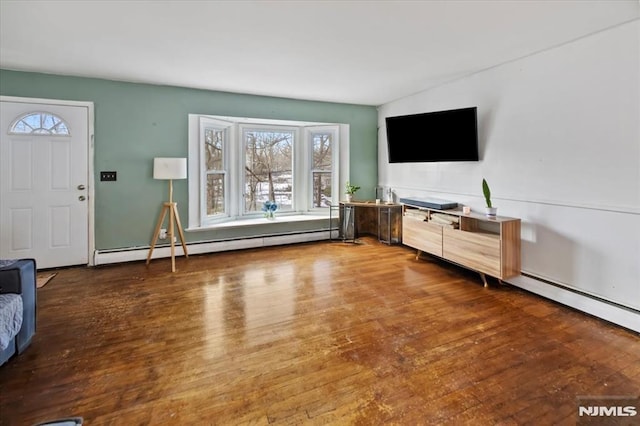 unfurnished living room featuring a baseboard radiator and dark hardwood / wood-style floors