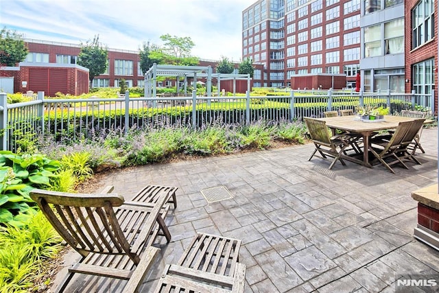 view of patio featuring a pergola