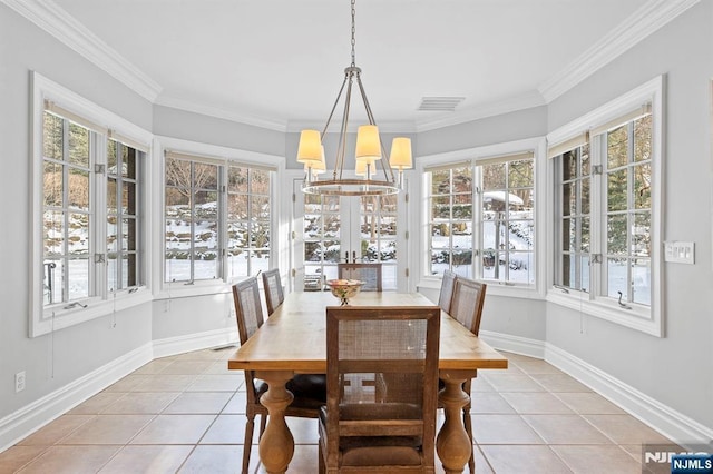 tiled dining room with ornamental molding