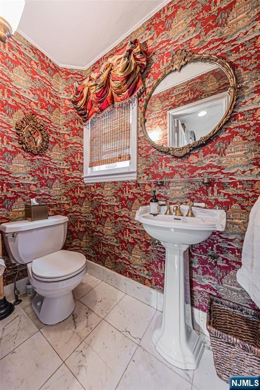 bathroom featuring toilet