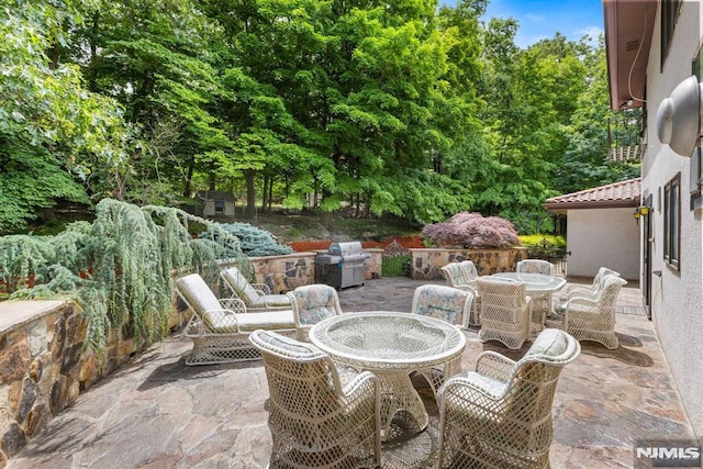 view of patio / terrace featuring a grill