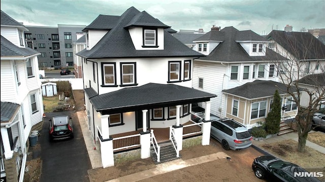 view of front facade featuring covered porch