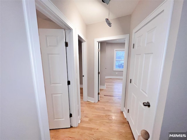 hallway featuring light hardwood / wood-style floors