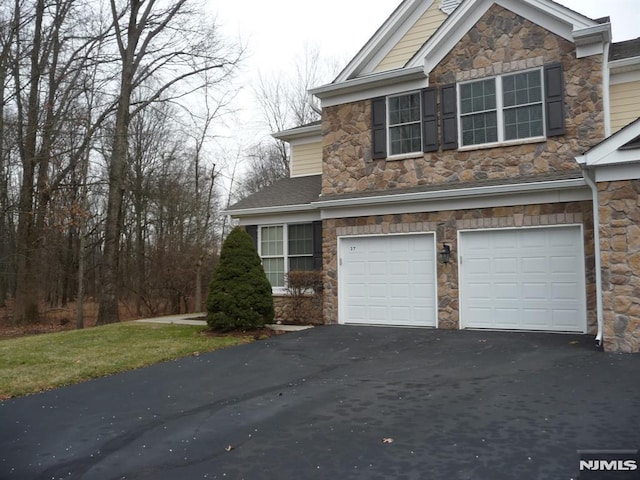 view of property exterior featuring a garage