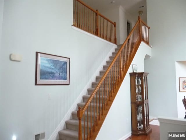 stairs with a high ceiling