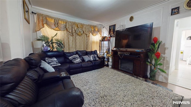 living room featuring crown molding