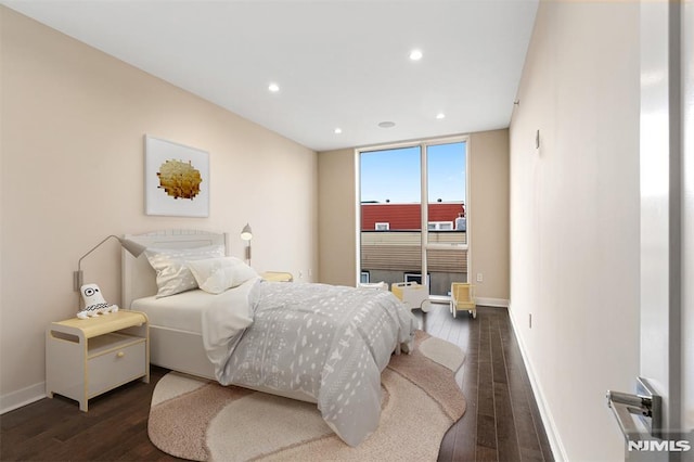 bedroom featuring dark wood-type flooring