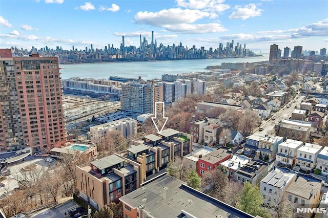 drone / aerial view featuring a water view