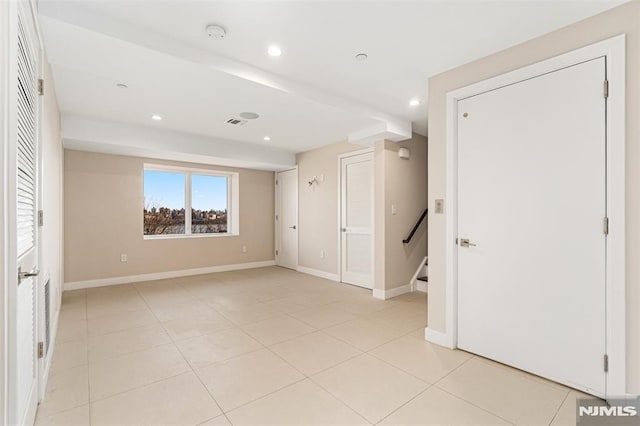 unfurnished bedroom featuring light tile patterned floors