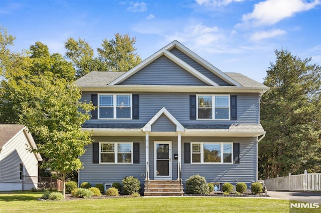 view of front of home with a front lawn