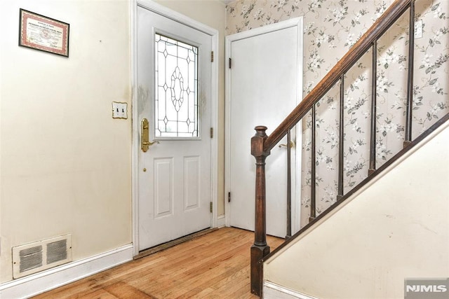 foyer with hardwood / wood-style floors