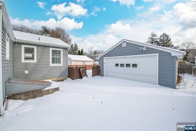 view of snow covered garage