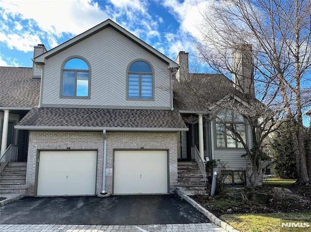 view of front of home with a garage