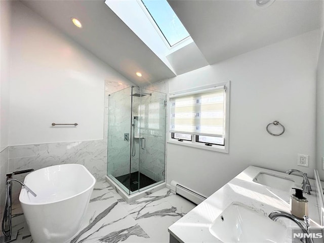 bathroom featuring vaulted ceiling with skylight, a baseboard radiator, vanity, tile walls, and plus walk in shower