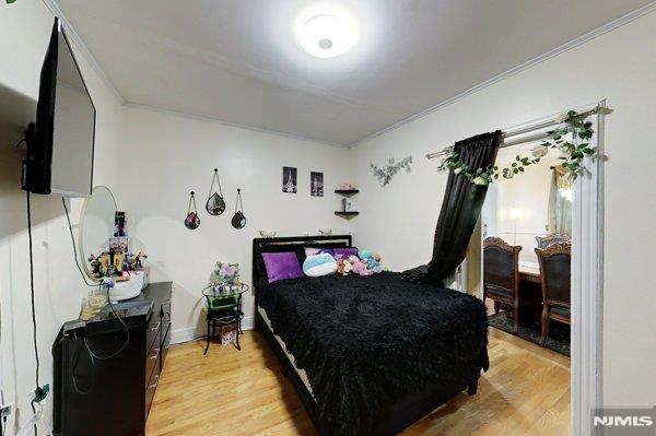 bedroom featuring light hardwood / wood-style flooring