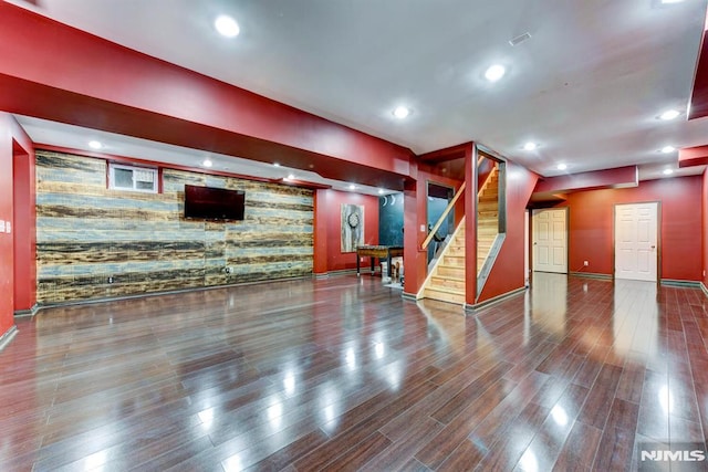 unfurnished living room with hardwood / wood-style floors