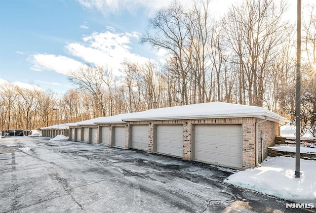 view of snow covered garage