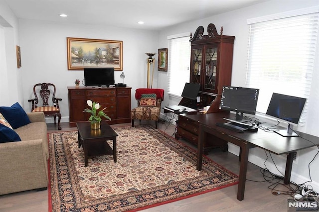 office area with wood-type flooring