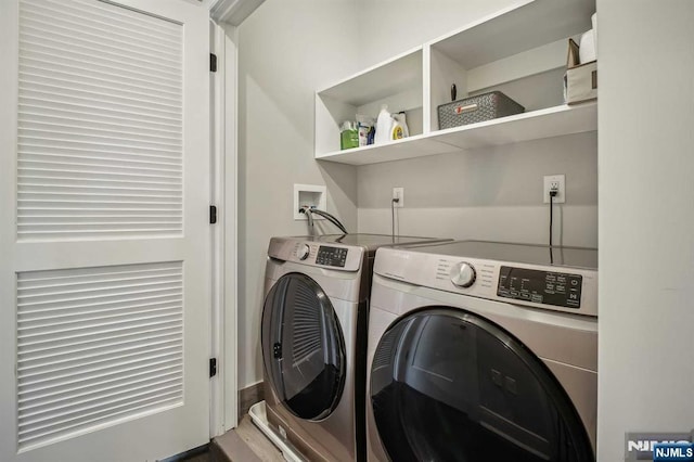 laundry area with washer and clothes dryer